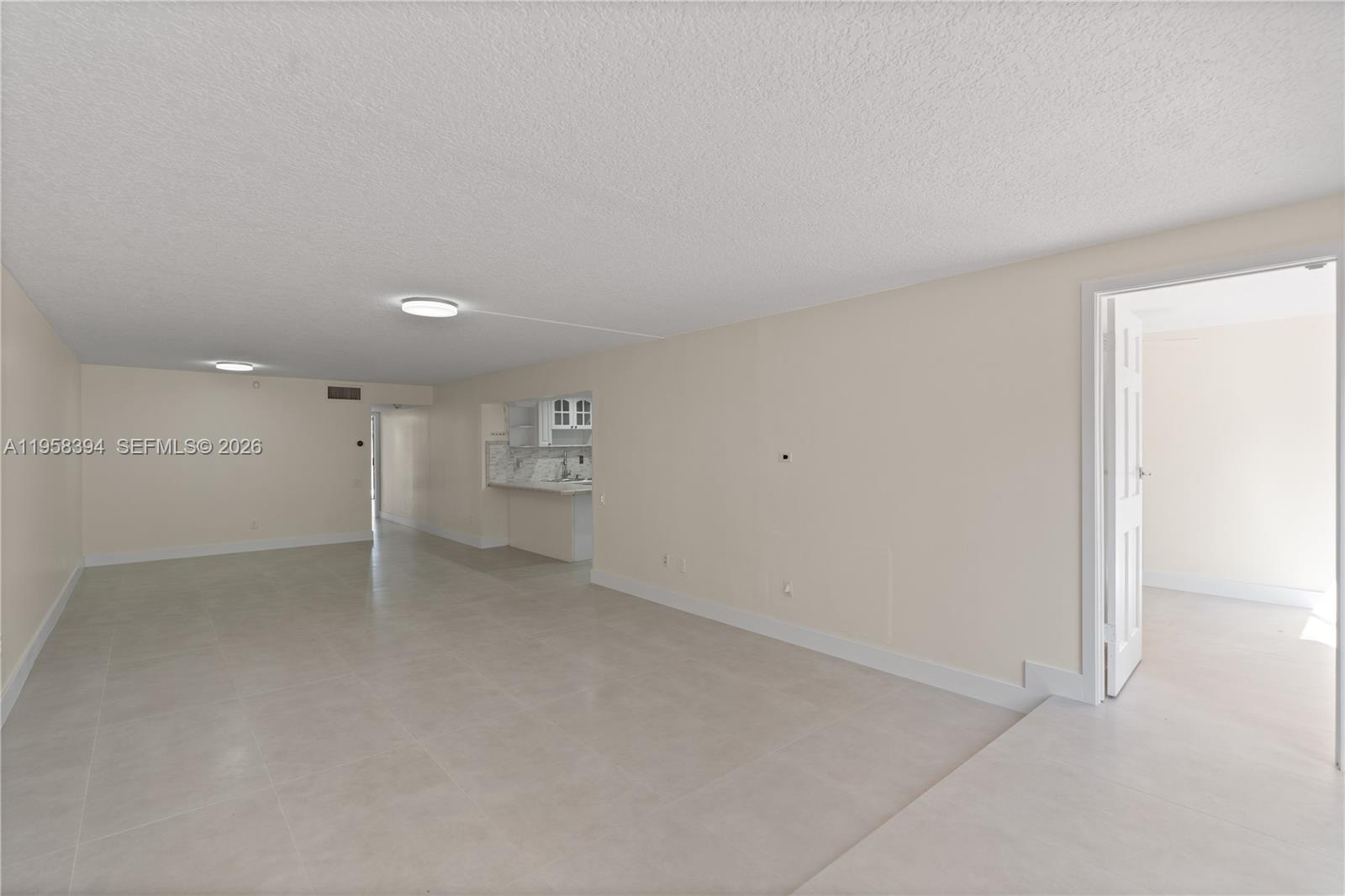 6907 Southwest 115th Place, Unit D40 Miami, FL 33173 - Photo 15 of 38 a view of an empty room