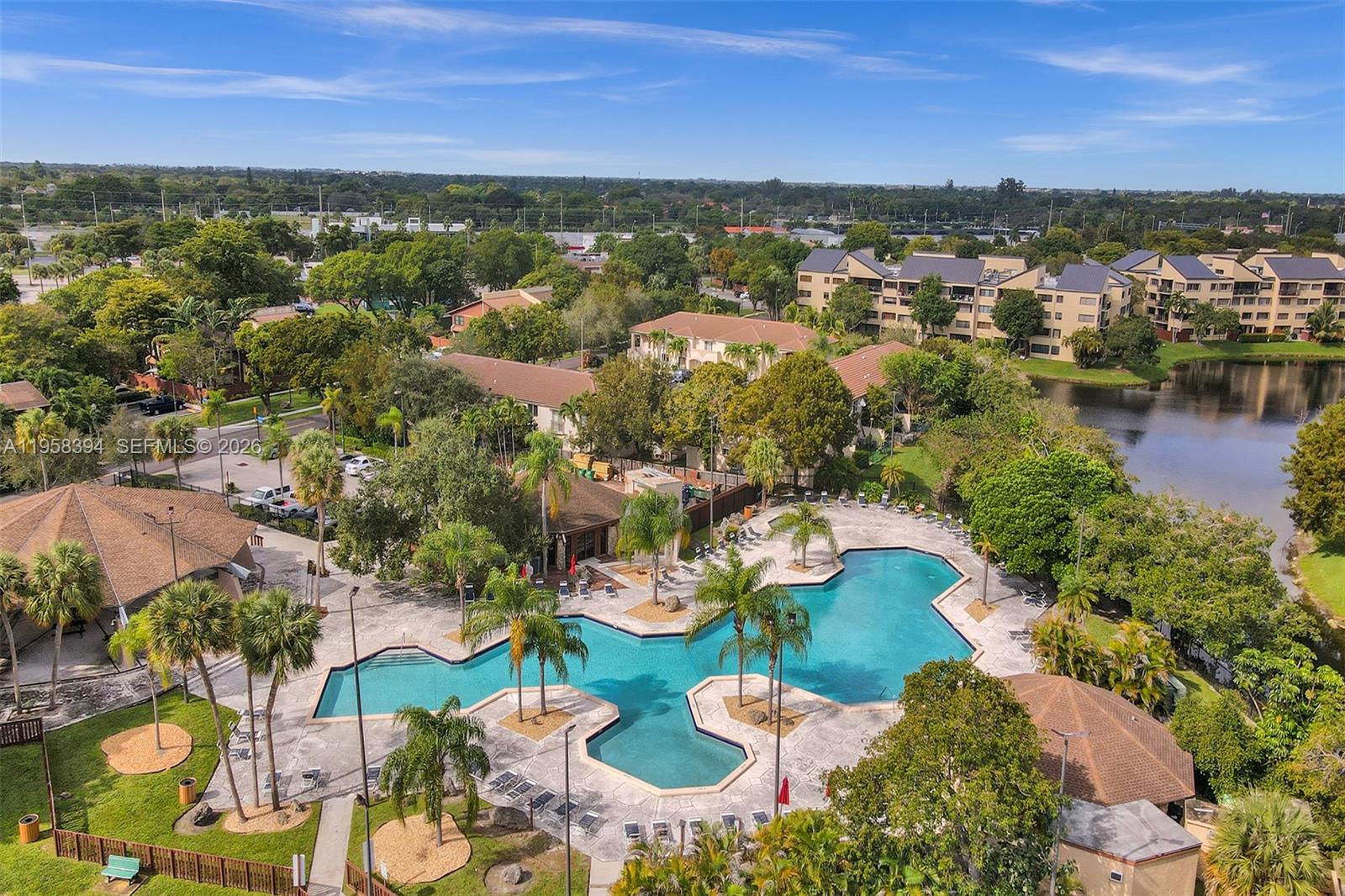 6907 Southwest 115th Place, Unit D40 Miami, FL 33173 - Photo 38 of 38 an aerial view of residential houses with outdoor space