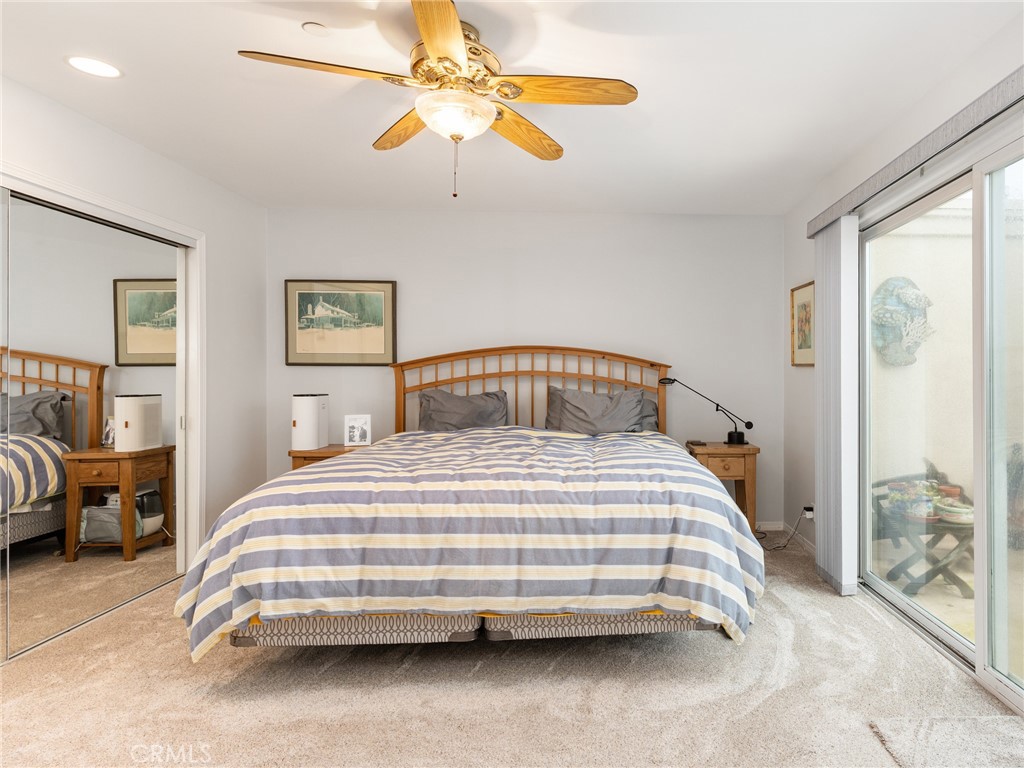 328 Virginia Street, Unit 4 El Segundo, CA 90245 - Photo 14 of 26 a bedroom with a bed and ceiling fan