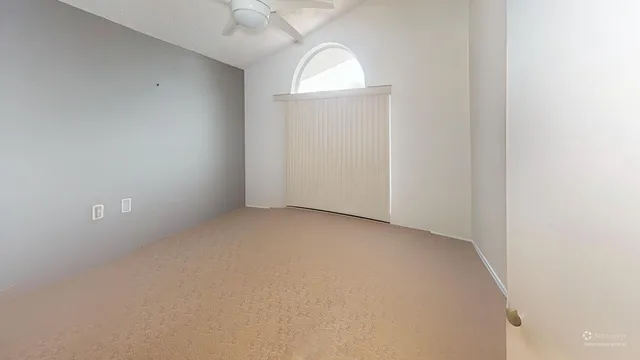 a bathroom with a sink mirror vanity and toilet