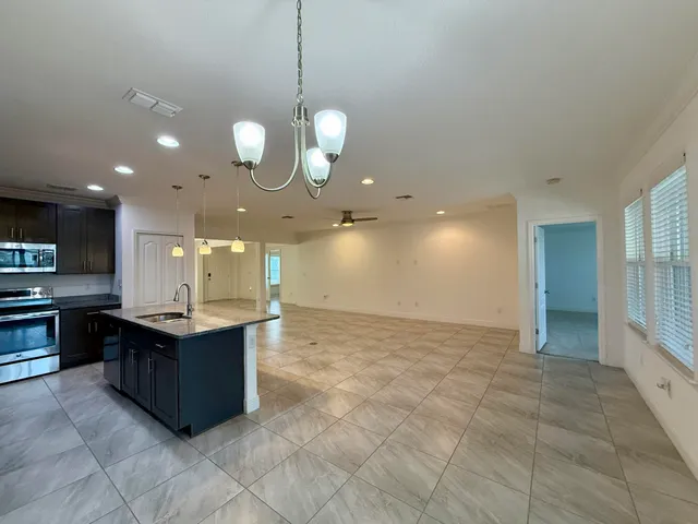 a view of kitchen and kitchen island