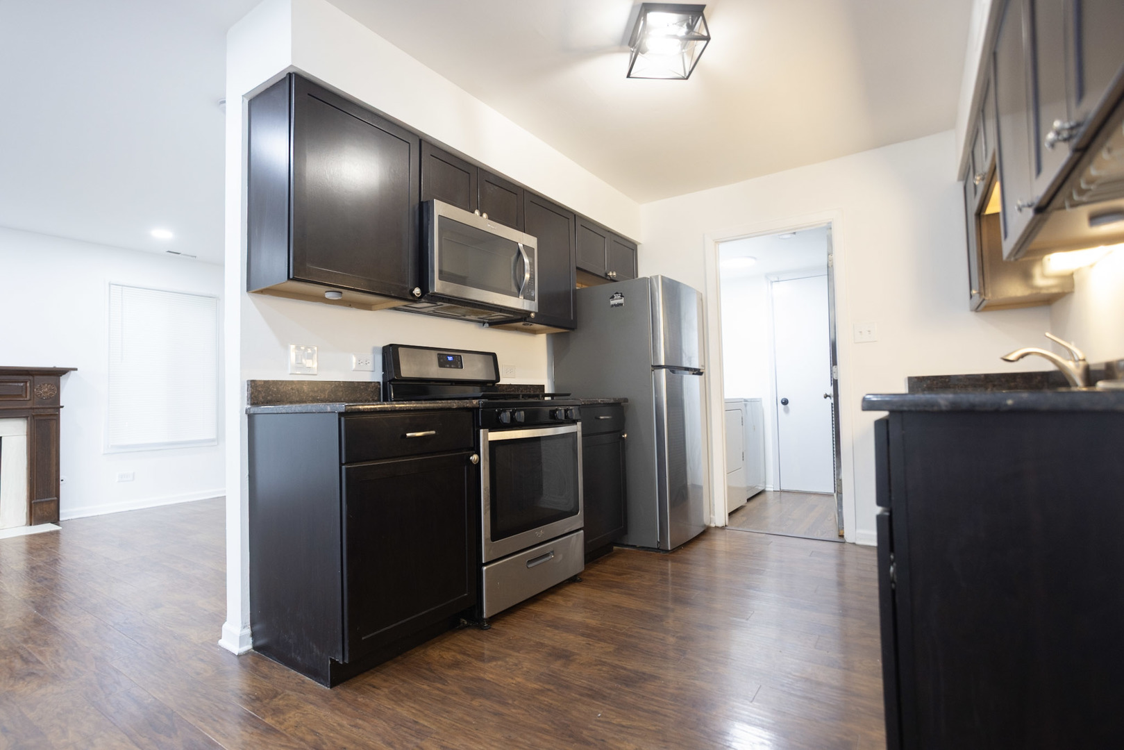 35 Churn Road, Unit 35 Matteson, IL 60443 - Photo 5 of 18 a kitchen with wooden cabinets and stainless steel appliances
