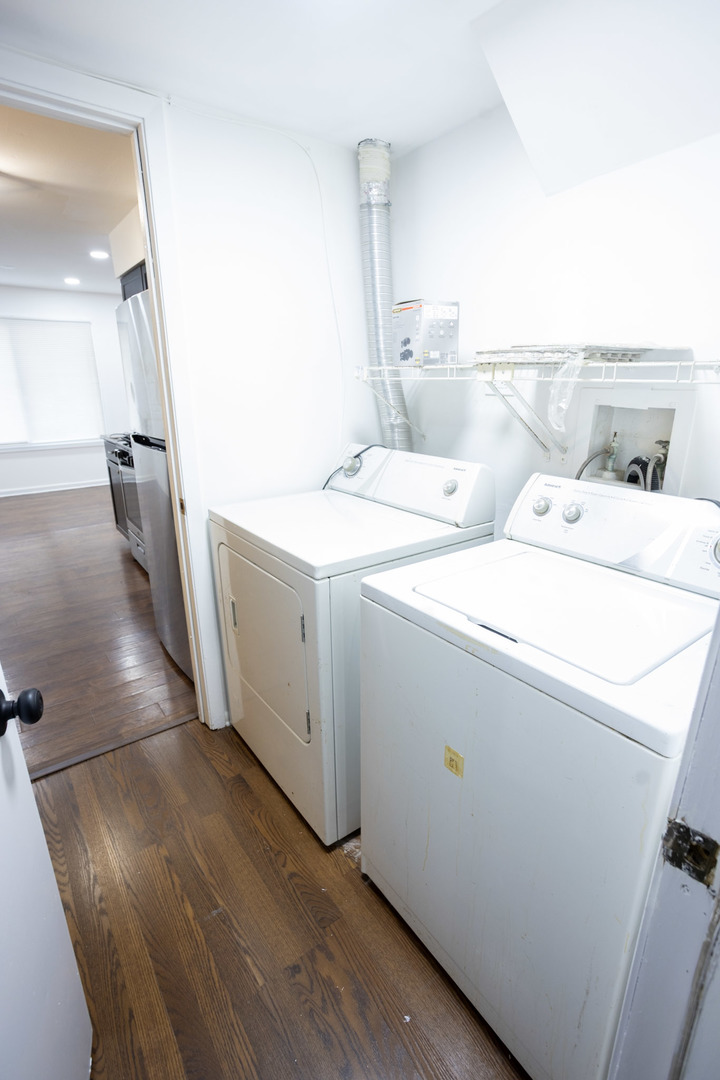 35 Churn Road, Unit 35 Matteson, IL 60443 - Photo 7 of 18 a view of washer and dryer with wooden floor