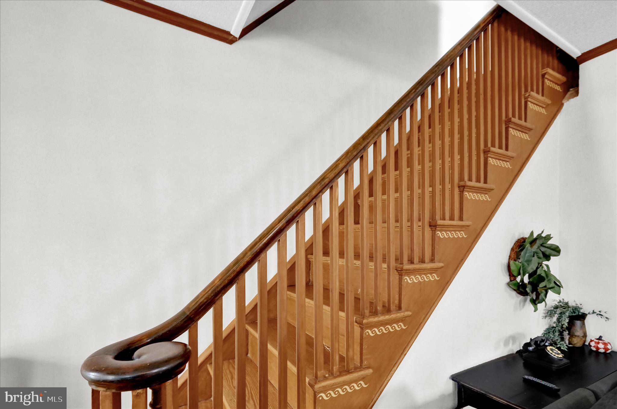 1722 Olive Street Reading, PA 19604 - Photo 14 of 31 a view of staircase with wooden floor and stairs