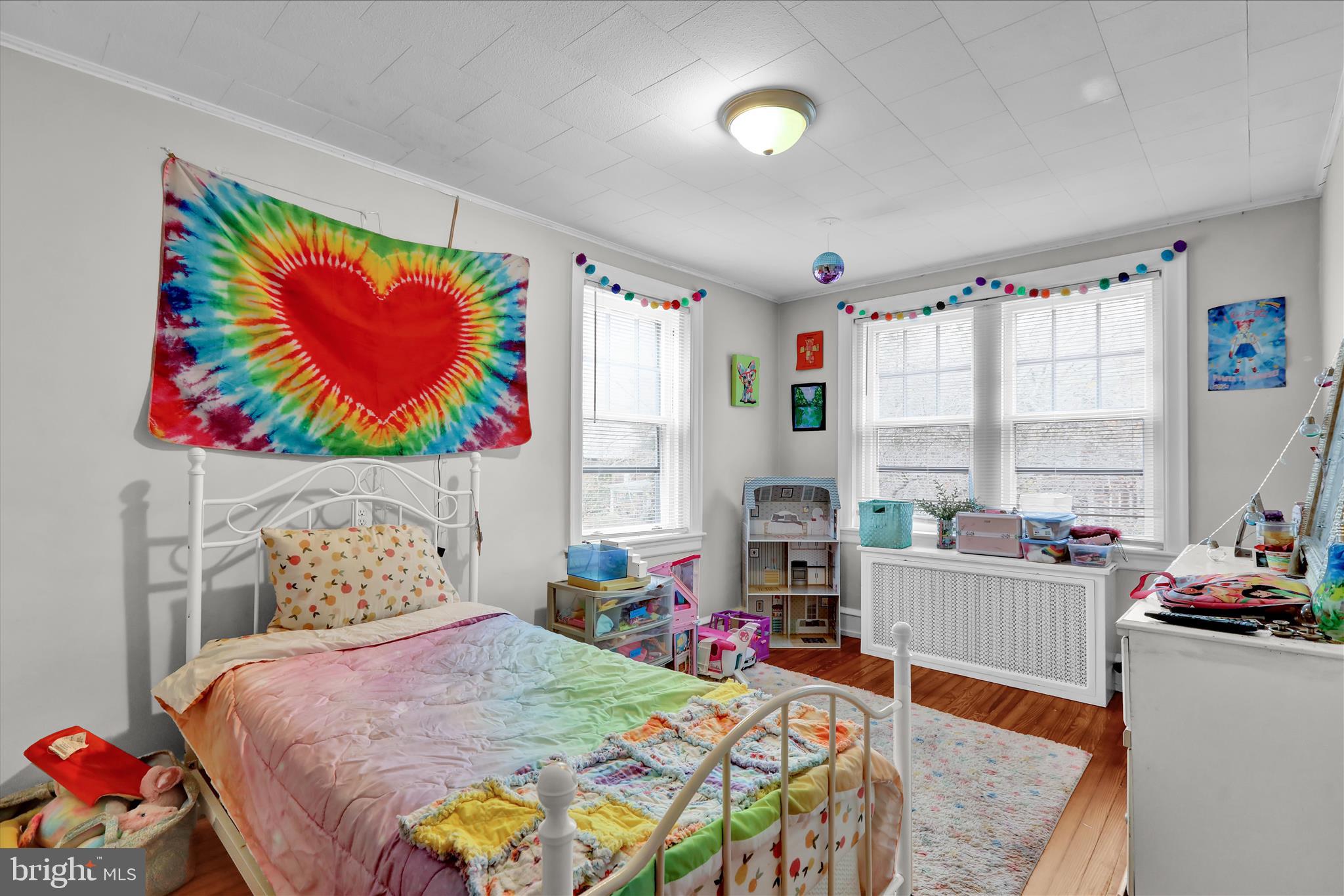 1722 Olive Street Reading, PA 19604 - Photo 20 of 31 a bedroom that has a bed and a chair in it