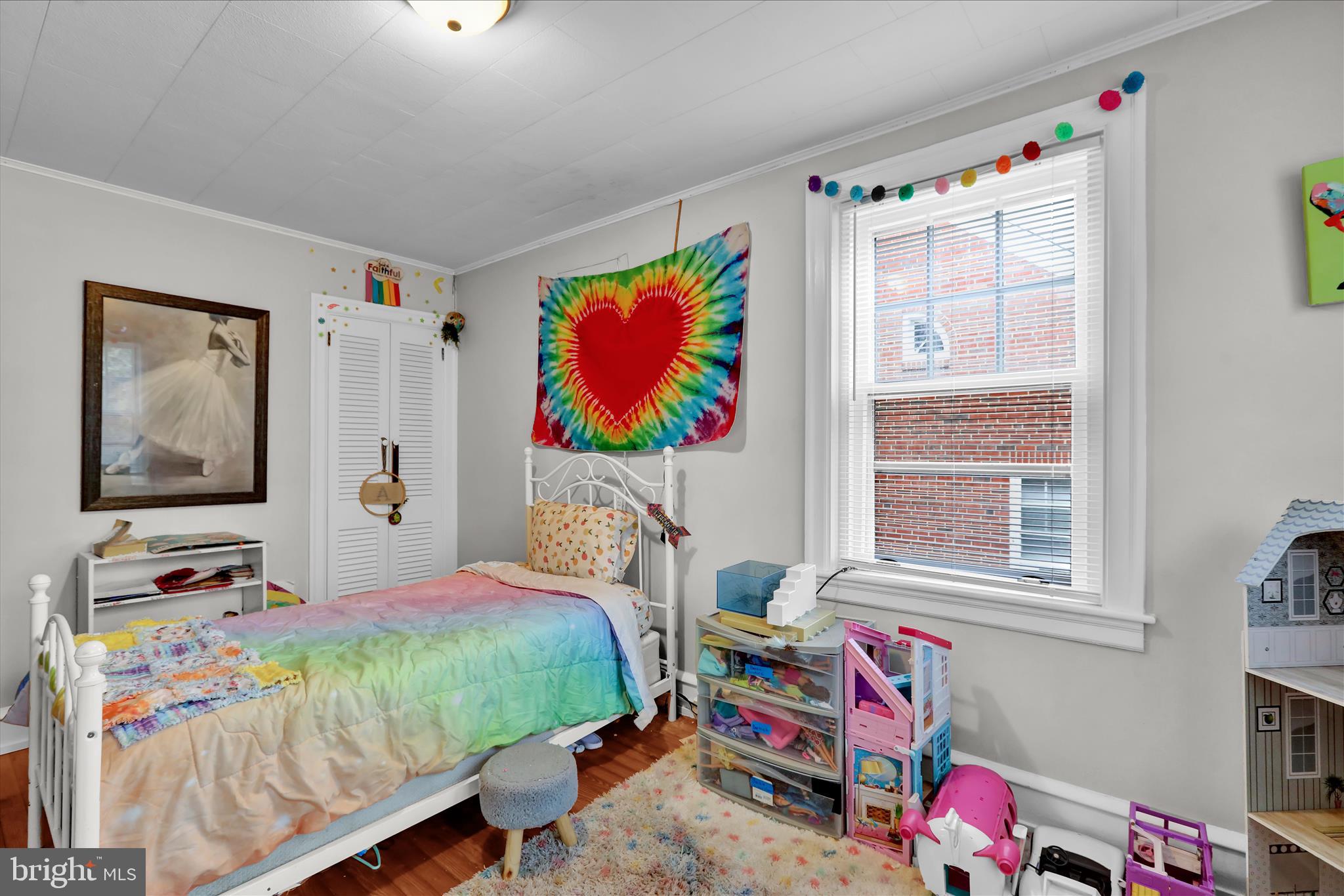 1722 Olive Street Reading, PA 19604 - Photo 21 of 31 a bedroom that has a bed and a chair in it