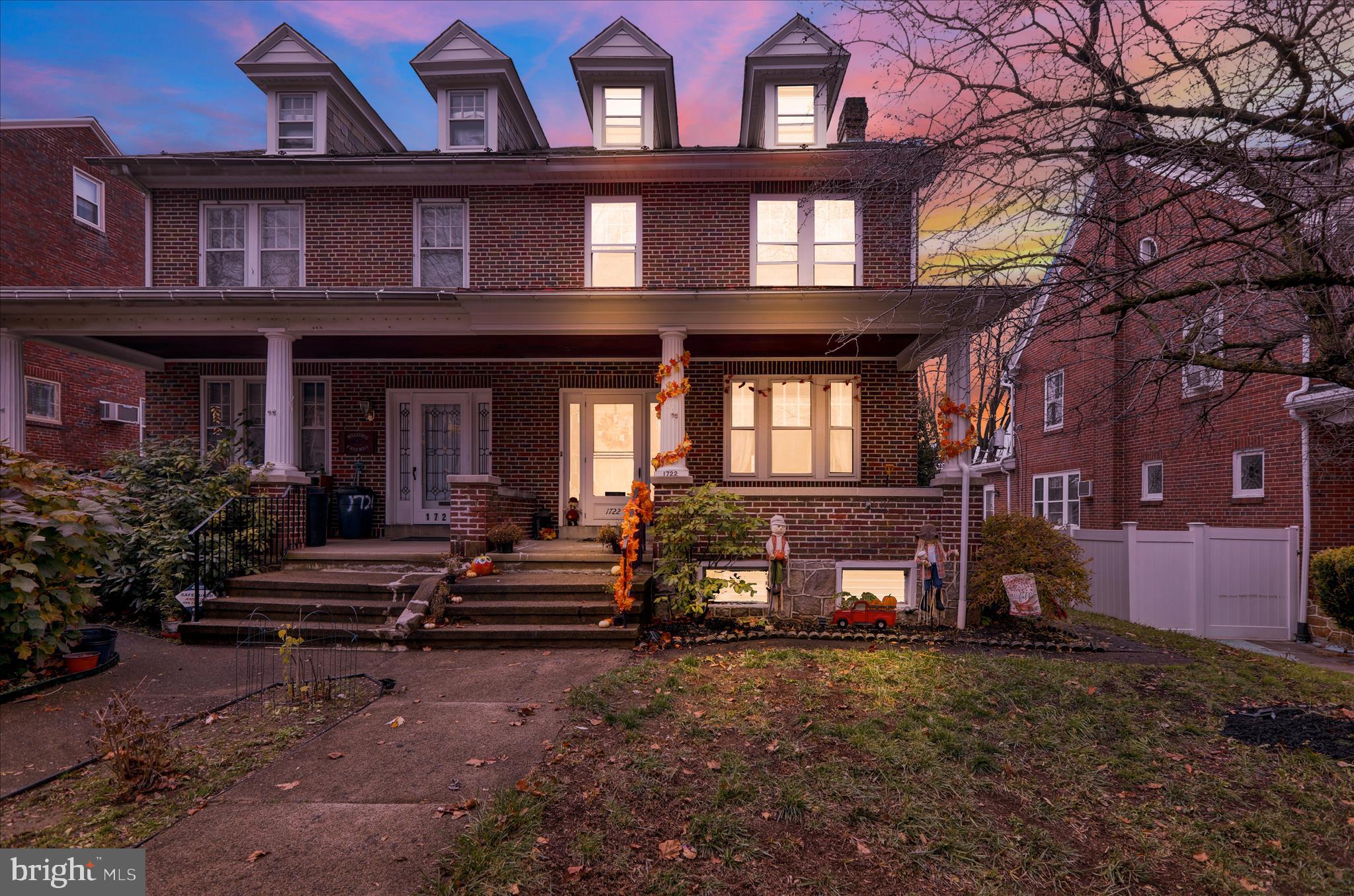 1722 Olive Street Reading, PA 19604 - Photo 3 of 31 a view of a building next to a yard