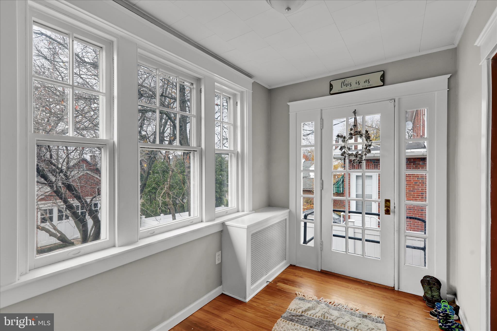 1722 Olive Street Reading, PA 19604 - Photo 8 of 31 a view of a livingroom with wooden floor and furniture