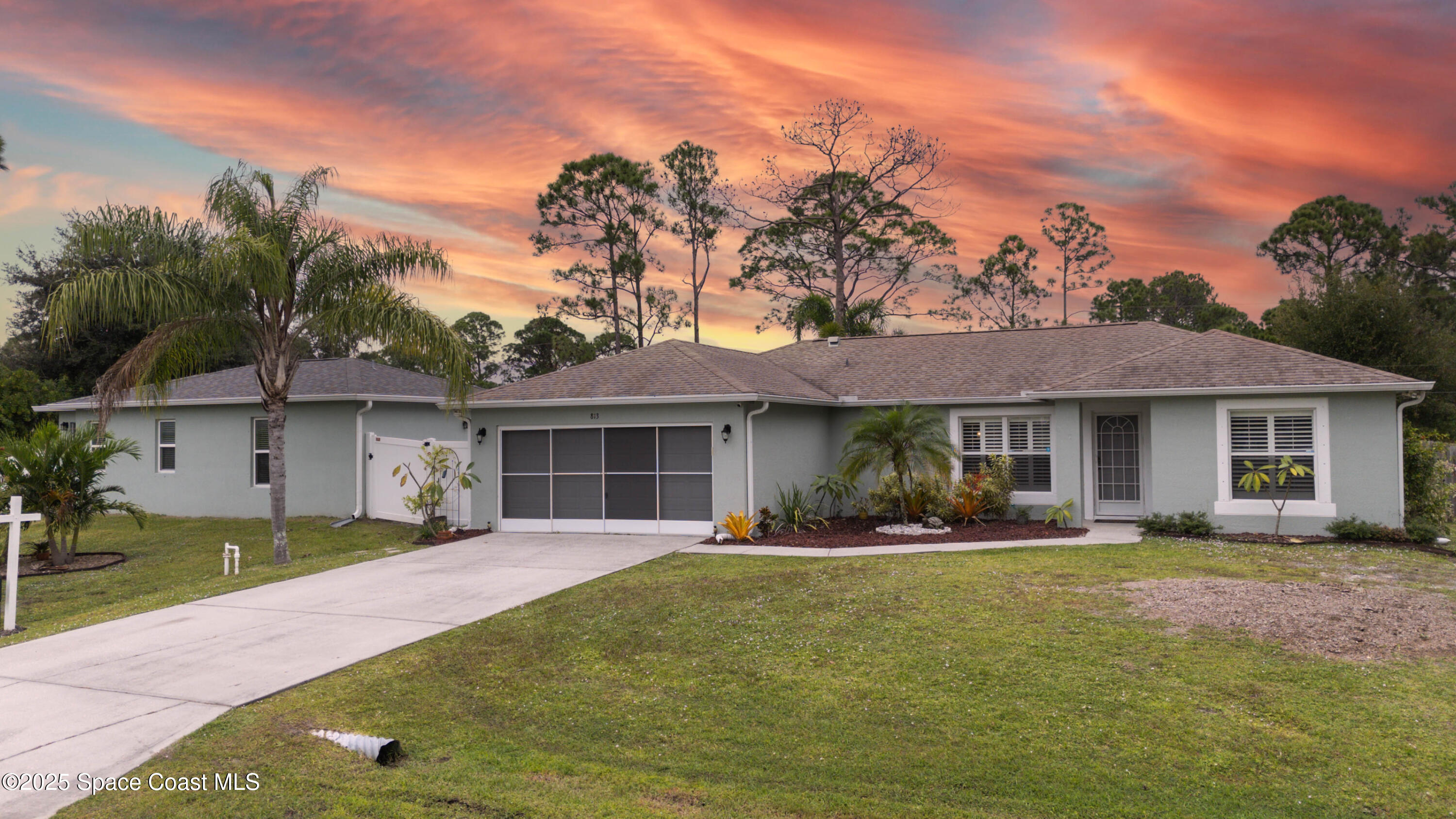 813 Tedder Road Southeast Palm Bay, FL 32909 - Photo 3 of 54 Front Twilight