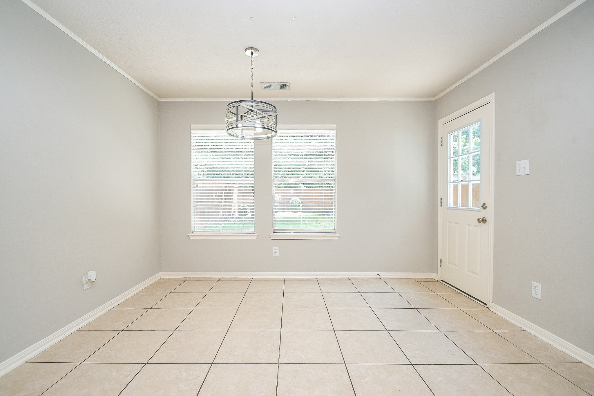 707 New Pines Drive Spring, TX 77373 - Photo 13 of 33 a view of an empty room with a window
