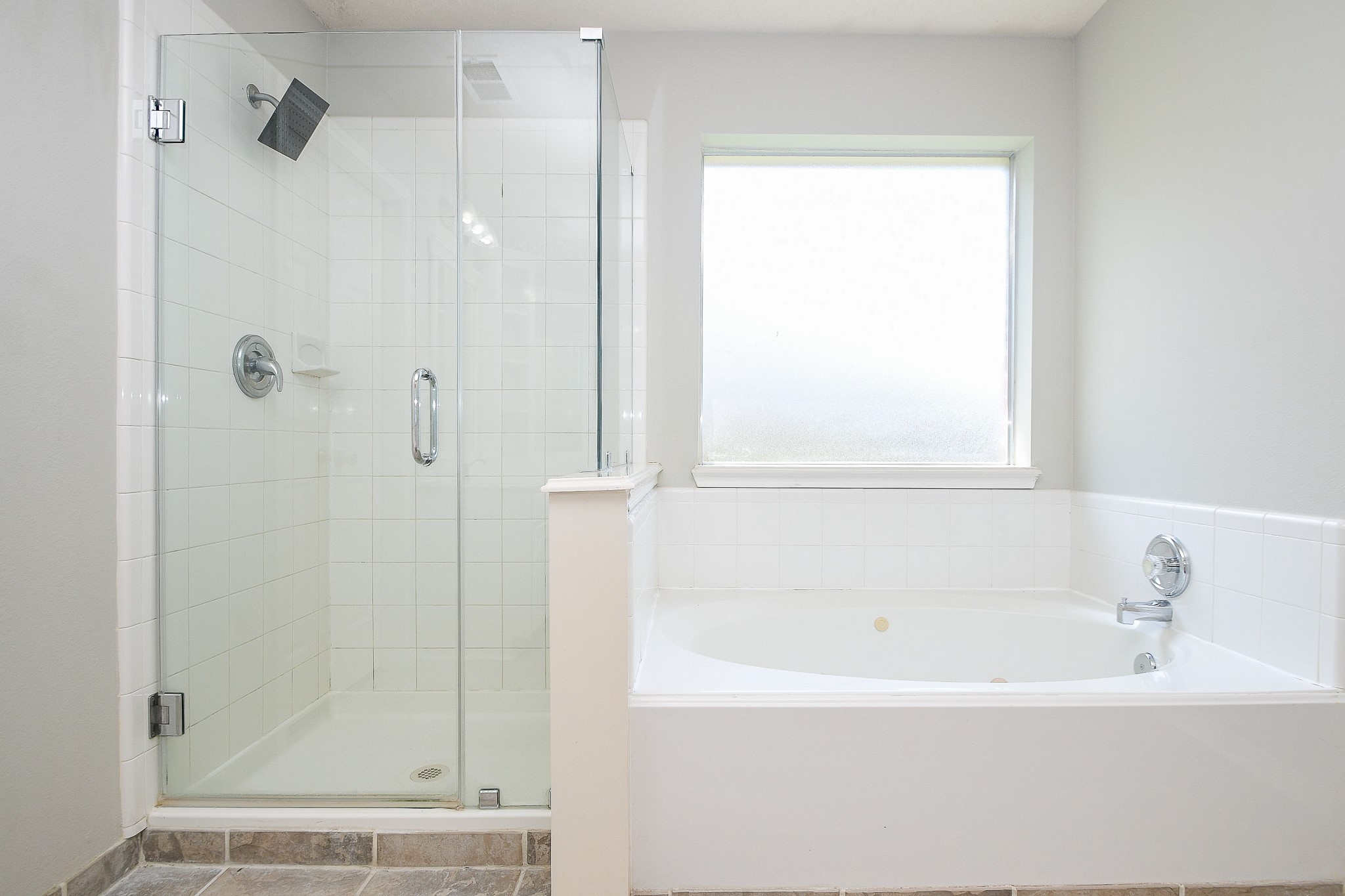 707 New Pines Drive Spring, TX 77373 - Photo 18 of 33 a white bath tub sitting next to a shower