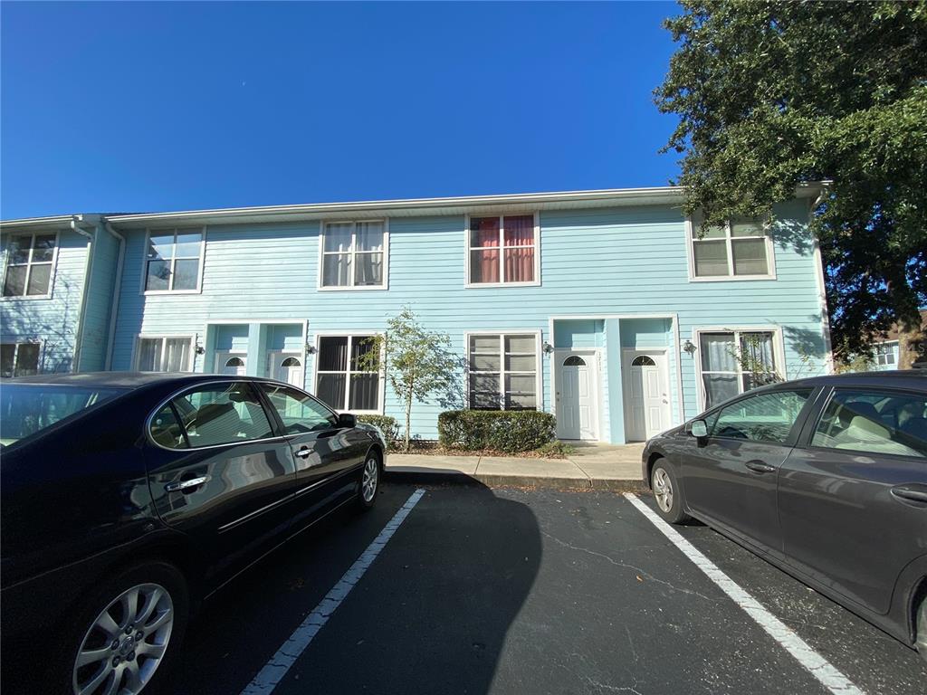 a car parked in front of a house