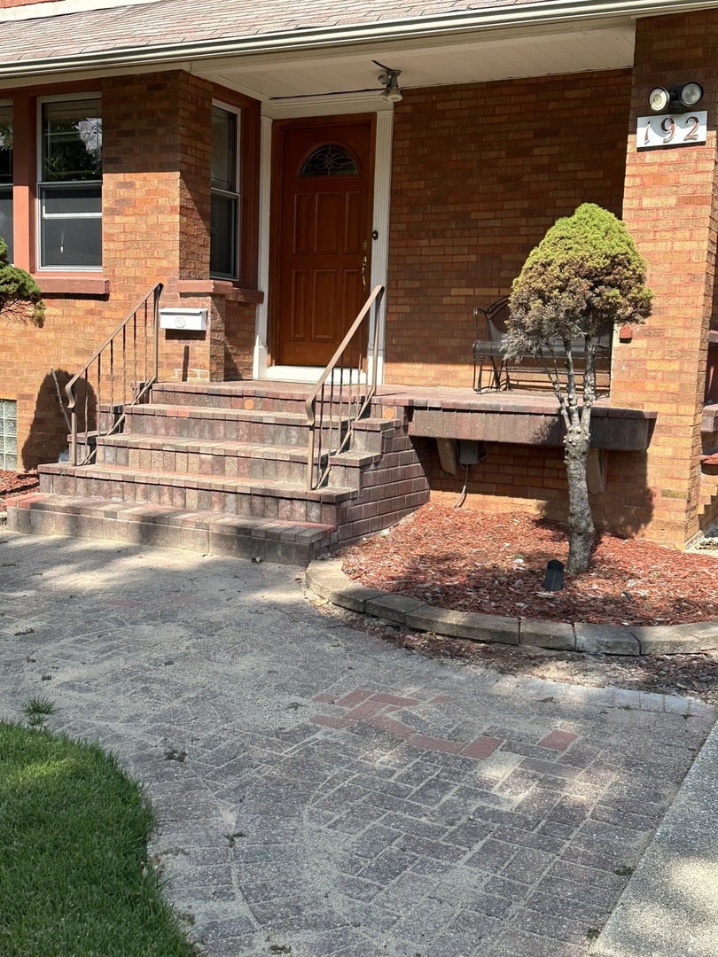 192 Waubansee Road Riverside, IL 60546 - Photo 2 of 19 a view of a house with backyard and sitting area