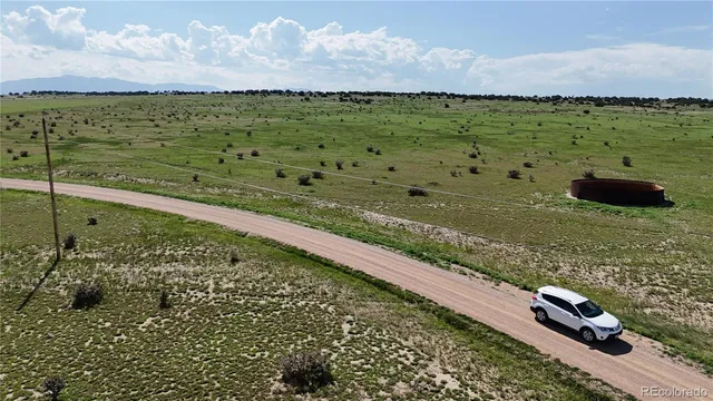 a view of a lake with a big yard
