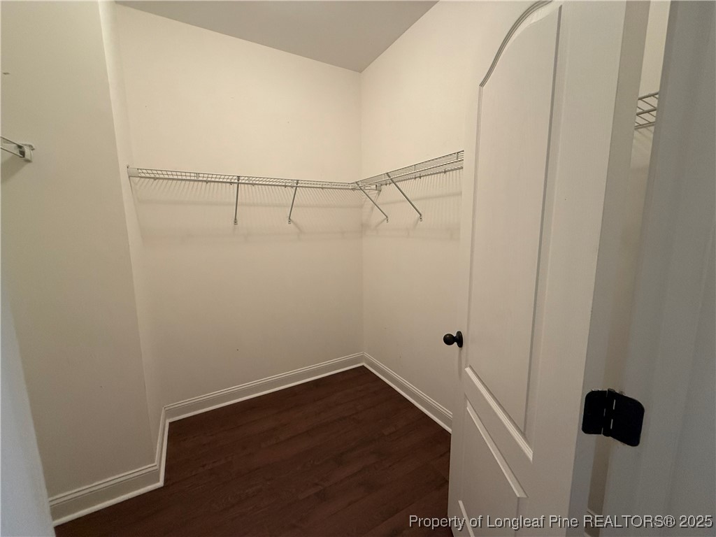 Undisclosed Address Spring Lake, NC 28390 - Photo 14 of 22 a view of small space with racks on the wall