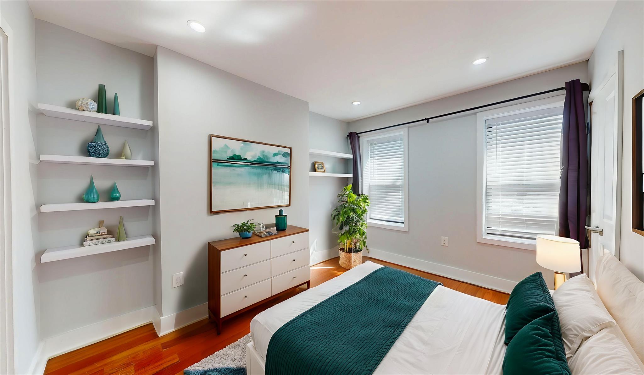 235 Sumpter Street Brooklyn, NY 11233 - Photo 3 of 7 Bedroom with baseboards, recessed lighting, and wood finished floors