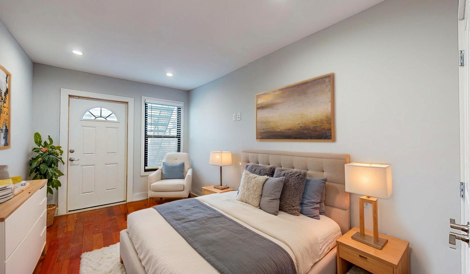 235 Sumpter Street Brooklyn, NY 11233 - Photo 4 of 7 Bedroom with recessed lighting, baseboards, and dark wood finished floors