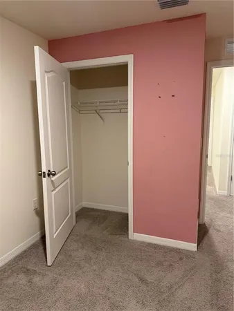 an empty room with a door