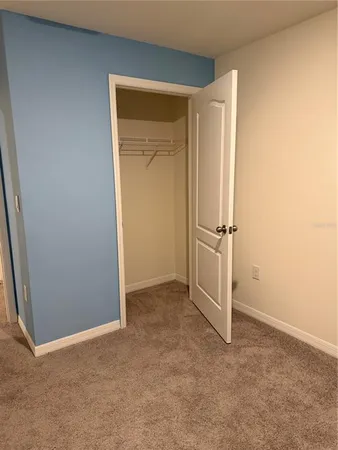 an empty room with closet
