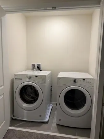 a utility room with dryer and washer