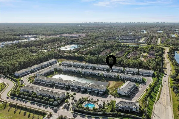 an aerial view of a house with a garden