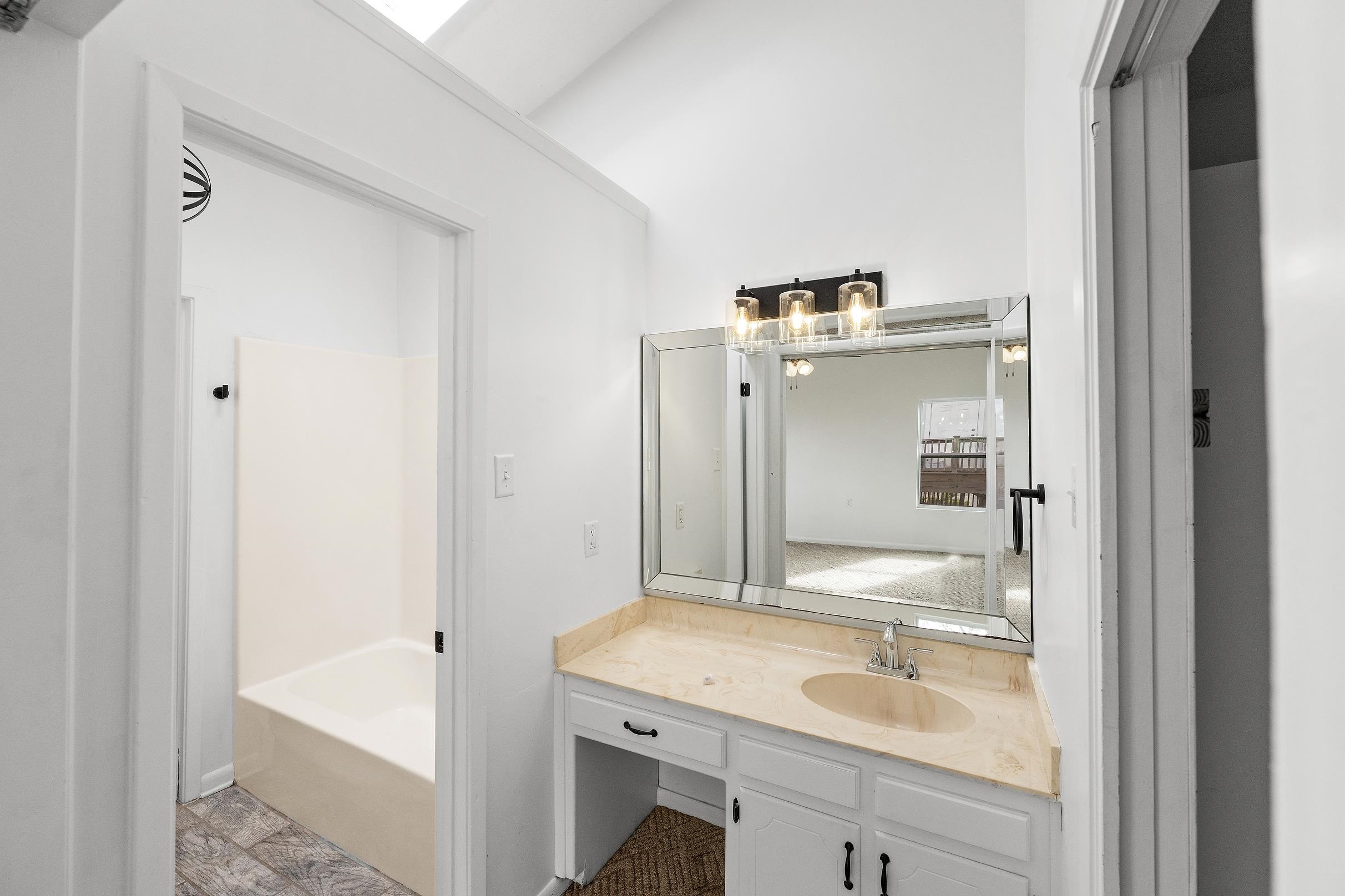 24321 Gulf Bay Road Orange Beach, AL 36561 - Photo 15 of 33 primary bathroom