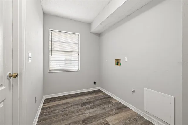 a view of a room that has a window in it