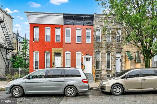 a car parked in front of a building