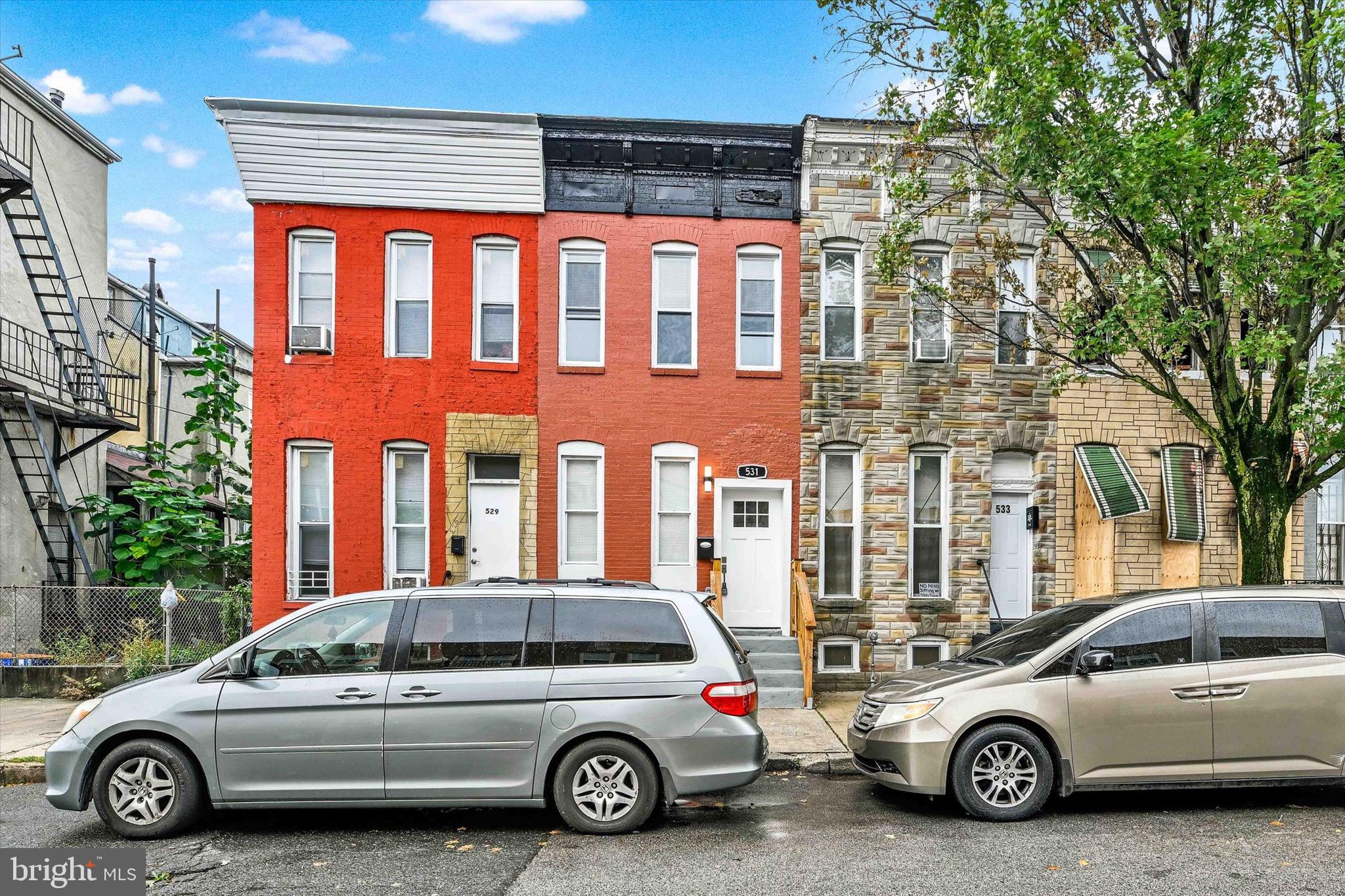 531 Wilson Street Baltimore, MD 21217 - Photo 2 of 24 a car parked in front of a building
