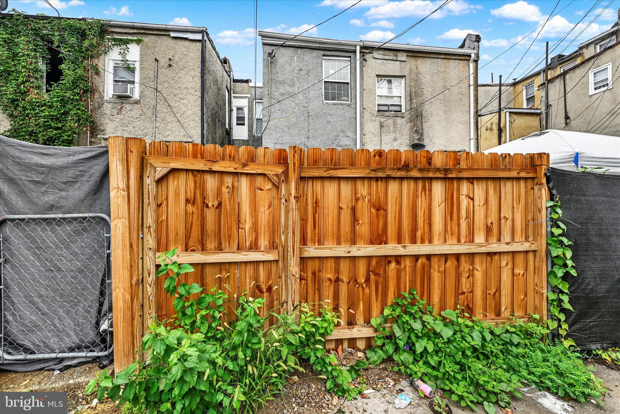 531 Wilson Street Baltimore, MD 21217 - Photo 24 of 24 a building with street sign