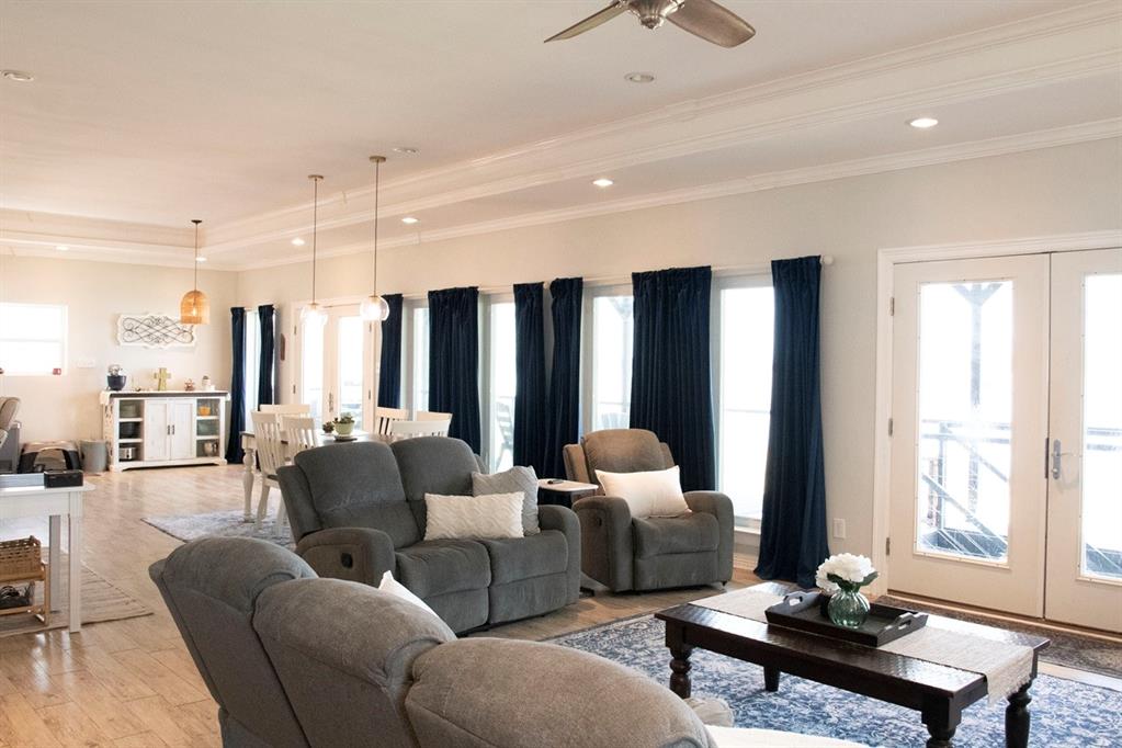 298 Redbud A Mexia, TX 76667 - Photo 11 of 40 a living room with furniture a rug and a large window