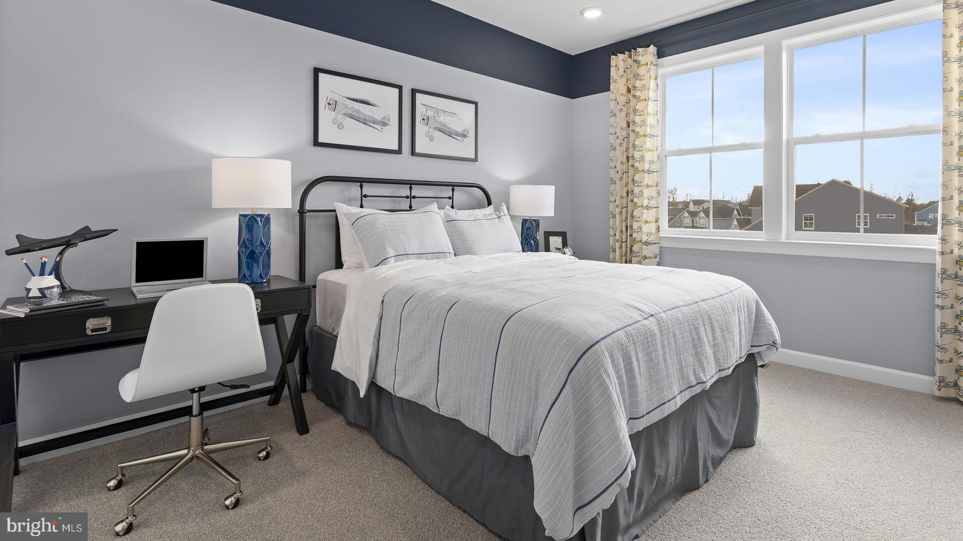 830 Reagans Road Frederick, MD 21702 - Photo 7 of 24 a bedroom with a bed chair and window