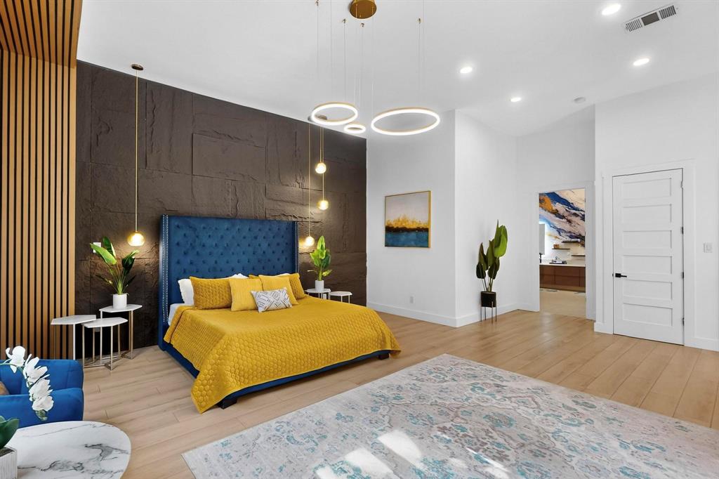 3946 North Cresthaven Road Dallas, TX 75209 - Photo 13 of 39 a bedroom with furniture and a wooden floor