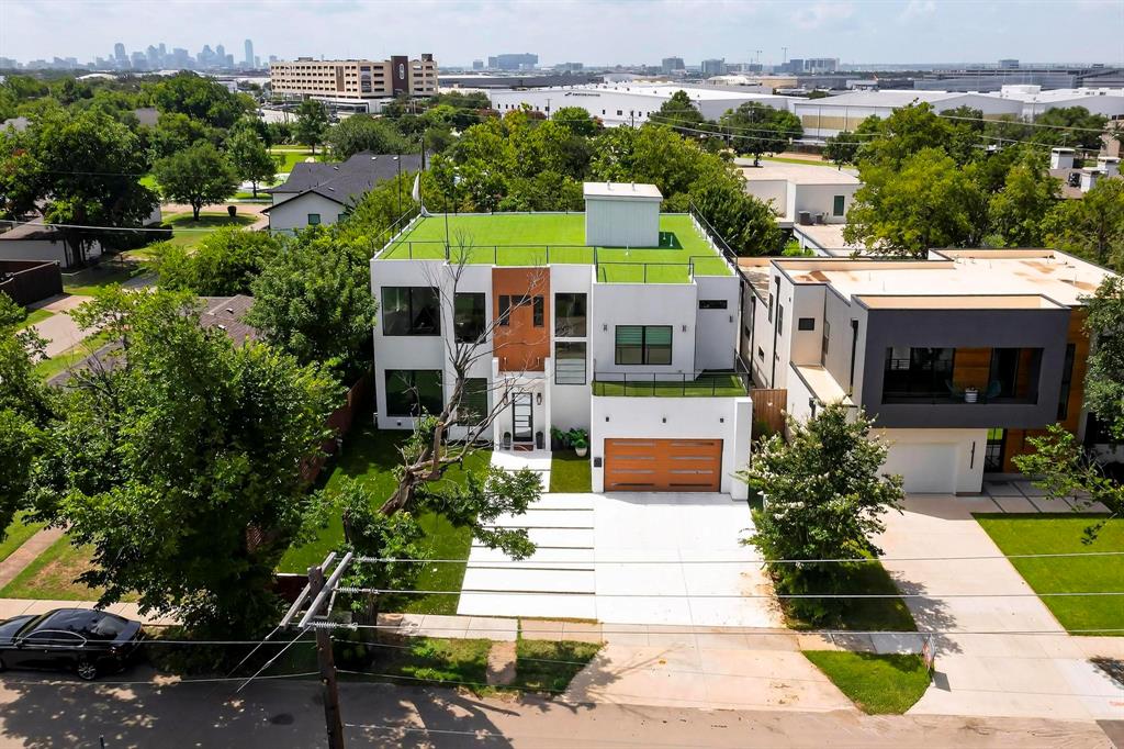 3946 North Cresthaven Road Dallas, TX 75209 - Photo 2 of 39 a front view of a house with a yard and potted plants