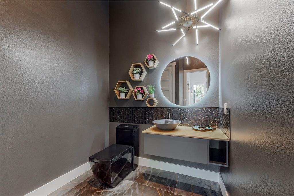 3946 North Cresthaven Road Dallas, TX 75209 - Photo 32 of 39 a living room with furniture and a wooden floor