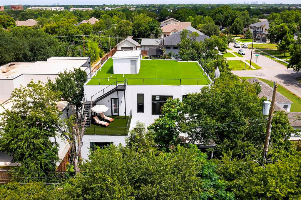 3946 North Cresthaven Road Dallas, TX 75209 - Photo 39 of 39 an aerial view of a house with a garden and lake view