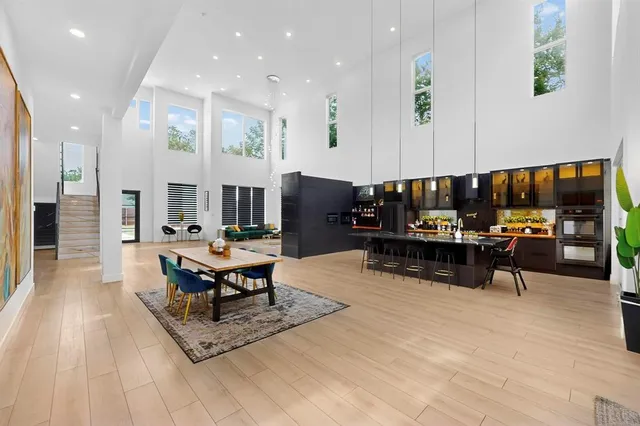 a living room filled with furniture and a table