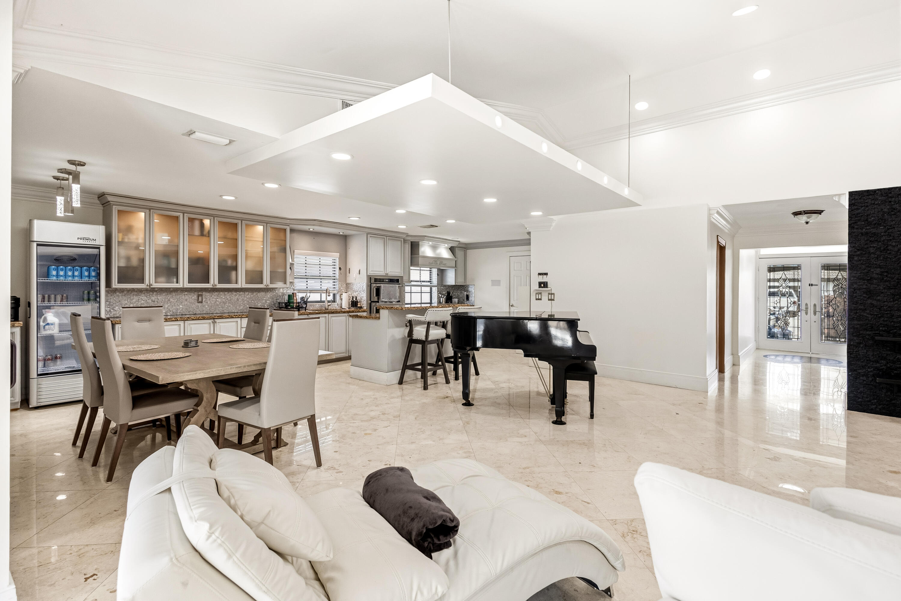 5223 Deerhurst Crescent Circle Boca Raton, FL 33486 - Photo 18 of 51 a living room with furniture and view of kitchen