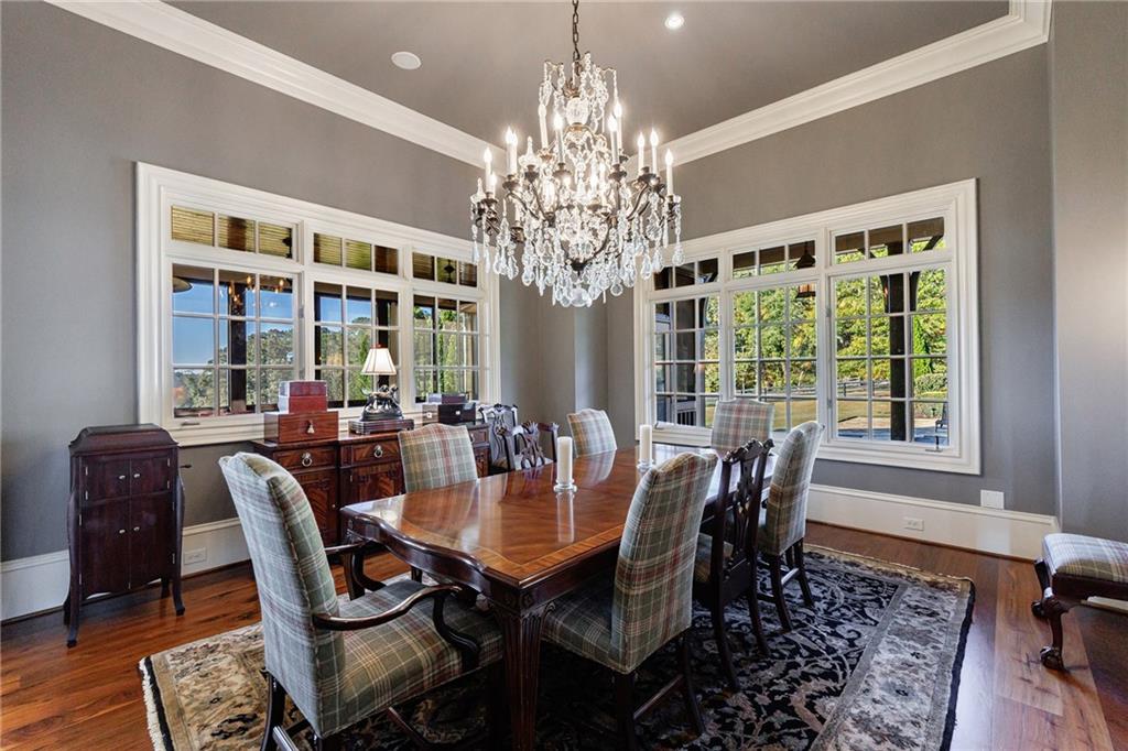 15750 Freemanville Road Milton, GA 30004 - Photo 11 of 30 a view of a dining room with furniture window and outside view