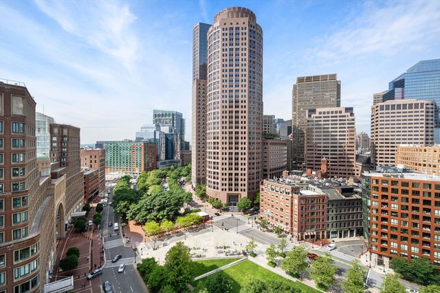a view of a city with tall buildings
