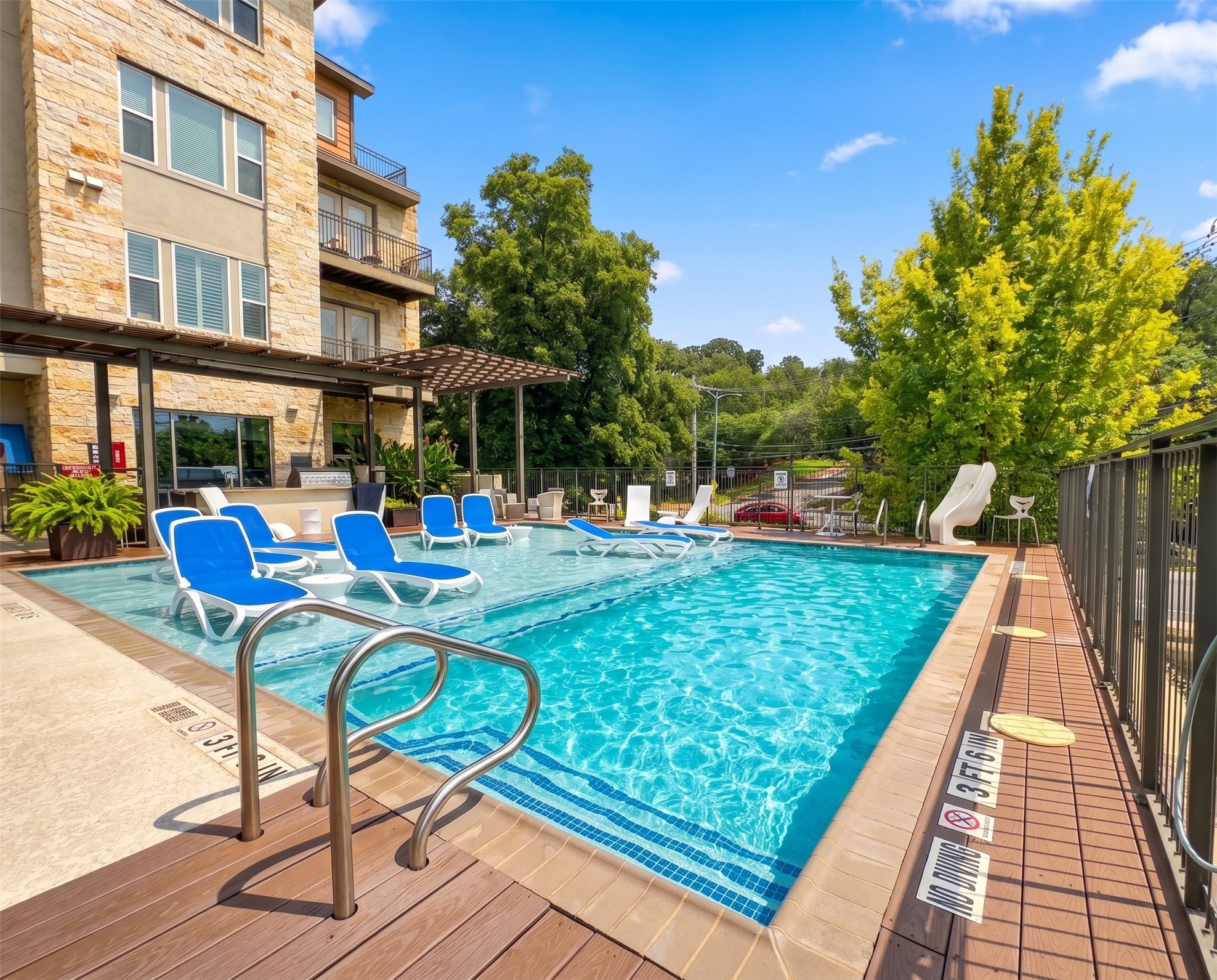 1900 Barton Springs Road, Unit 3036 Austin, TX 78704 - Photo 11 of 19 Another inviting view of the pool. Grills and plenty of space for guests
