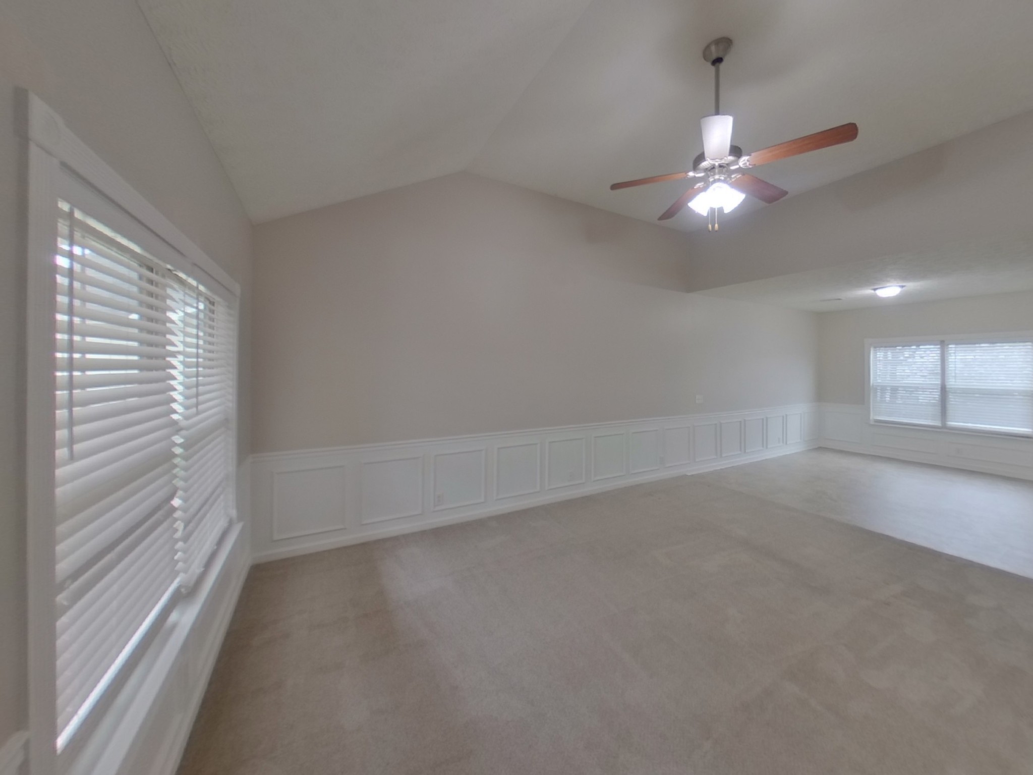 1712 Colyn Avenue Murfreesboro, TN 37128 - Photo 2 of 18 an empty room with a window and ceiling fan