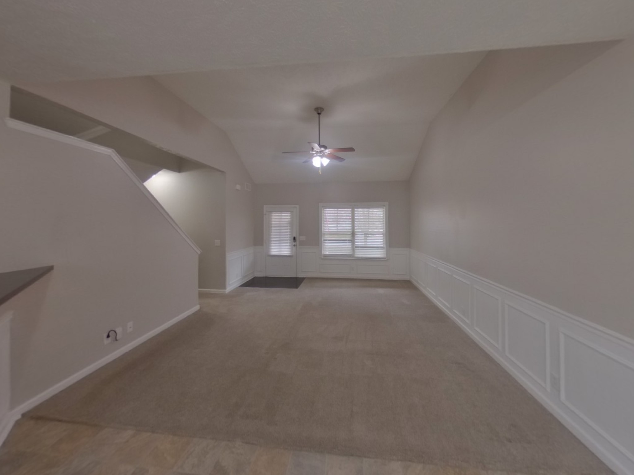 1712 Colyn Avenue Murfreesboro, TN 37128 - Photo 3 of 18 an empty room with windows and chandelier fan