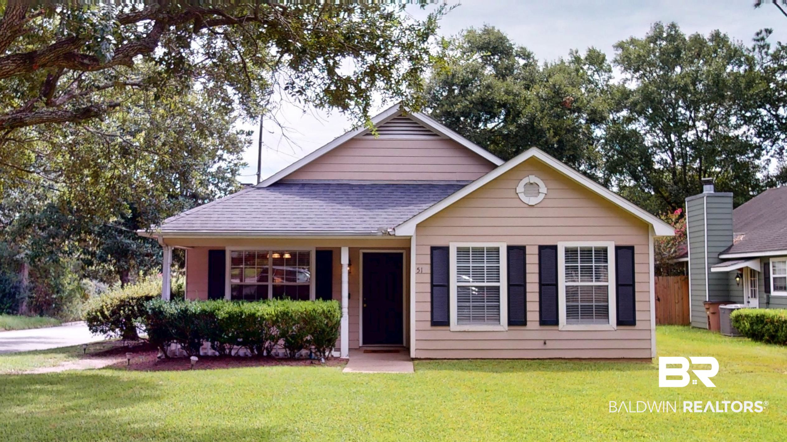 51 Bishop Lane South Mobile, AL 36608 - Photo 1 of 19 Bungalow-style house featuring a front lawn and a shingled roof