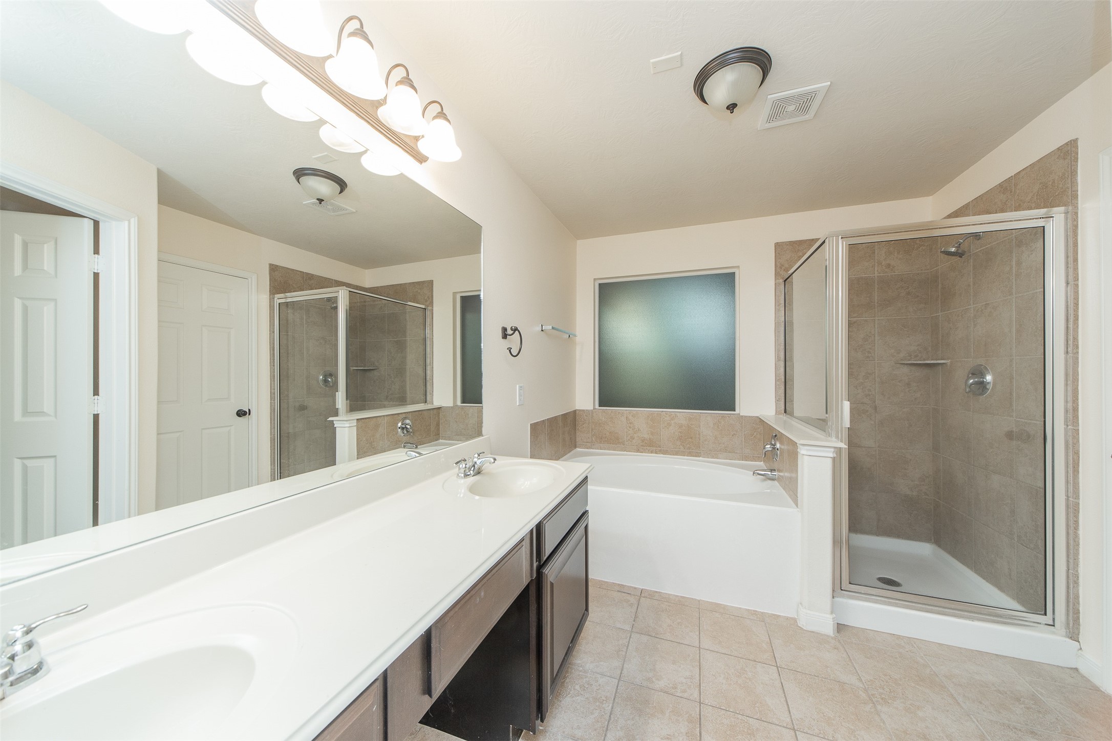 3418 Lily Ranch Drive Katy, TX 77494 - Photo 16 of 24 a spacious bathroom with a tub shower and sink