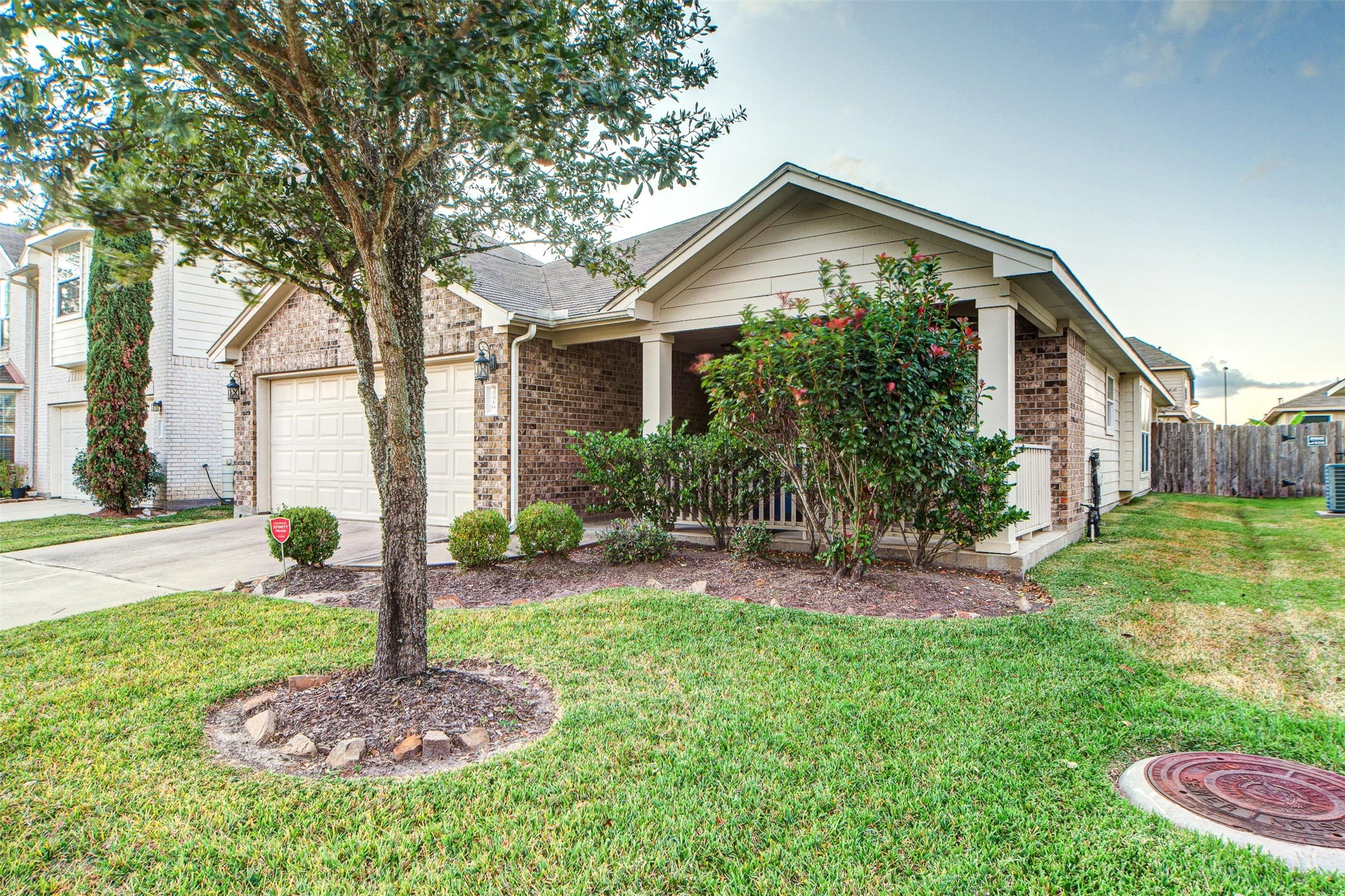 3418 Lily Ranch Drive Katy, TX 77494 - Photo 2 of 24 a front view of a house with a yard