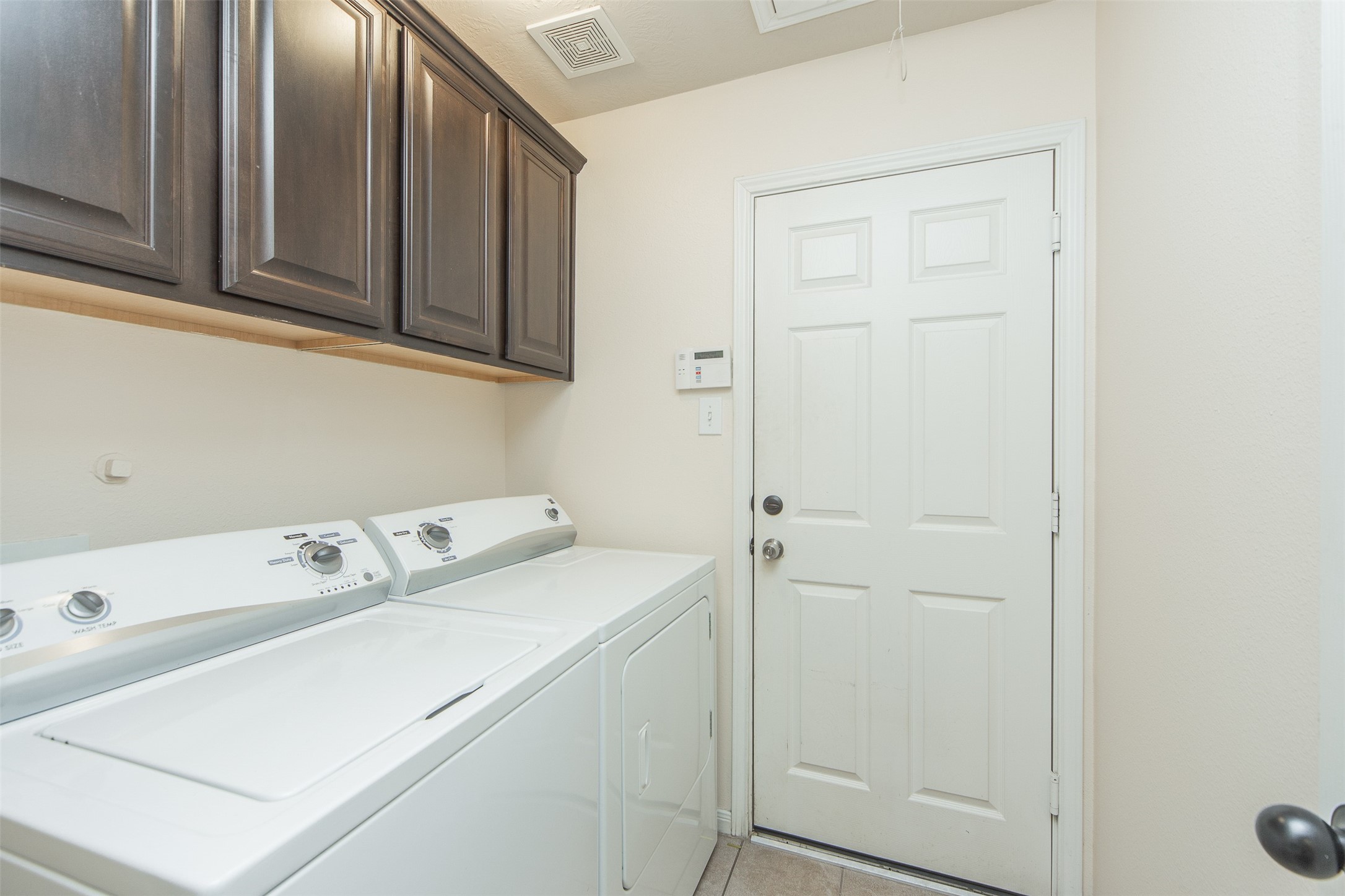3418 Lily Ranch Drive Katy, TX 77494 - Photo 21 of 24 a utility room with dryer and washer