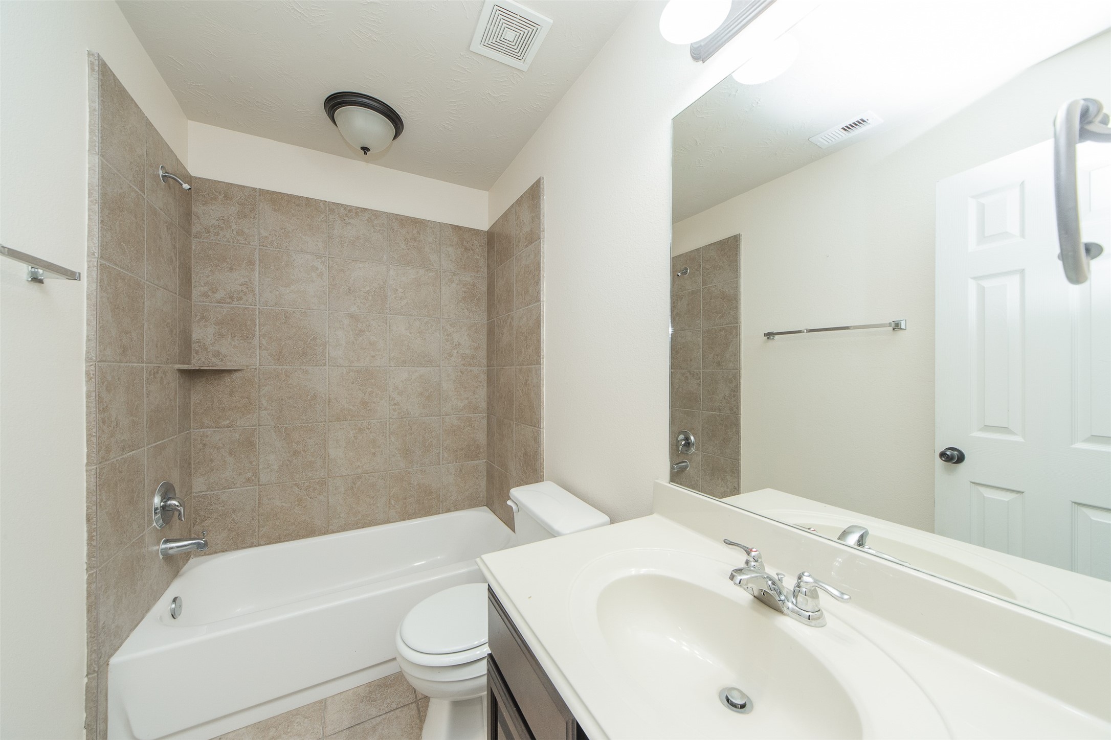 3418 Lily Ranch Drive Katy, TX 77494 - Photo 22 of 24 a bathroom with a sink toilet and shower