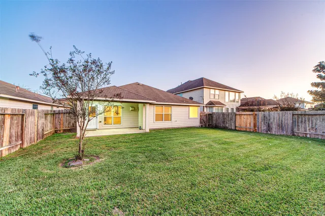 a house view with a garden space
