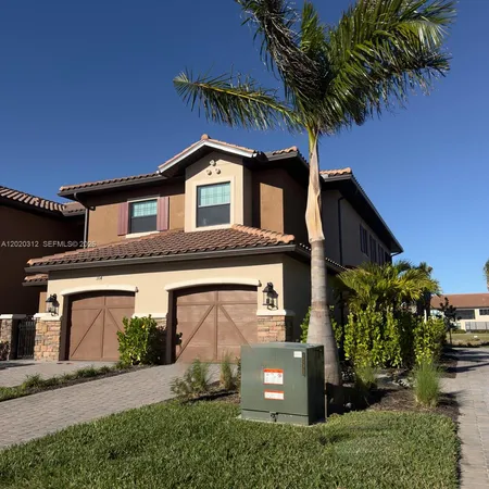 front view of a house with a street